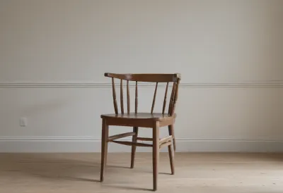 A single wooden dining chair standing alone in a plain empty room.